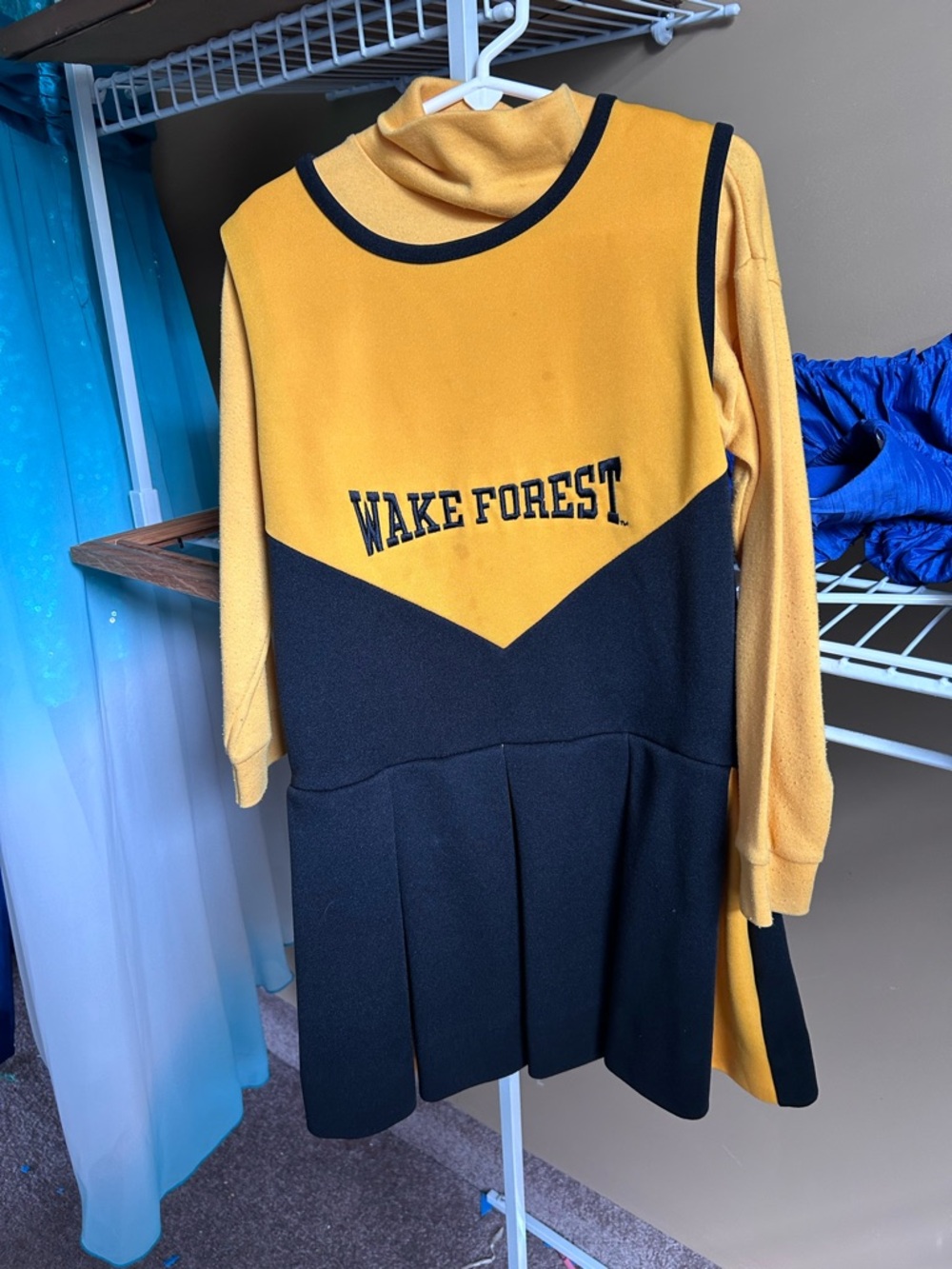Wake Forest children’s cheer outfit. Gold and Black Cheer